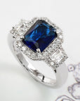 2.5 Carat Radiant Blue Sapphire Halo Cubic Zirconia Engagement Ring In Sterling Silver - Boutique CZ