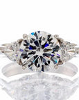 Brilliant Round Triangle Cut Cubic Zirconia Engagement Ring In Sterling Silver - Boutique Pavè