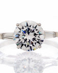 Round Solitaire Baguette Cubic Zirconia Engagement Ring In White Gold Plated Sterling Silver - Boutique Pavè