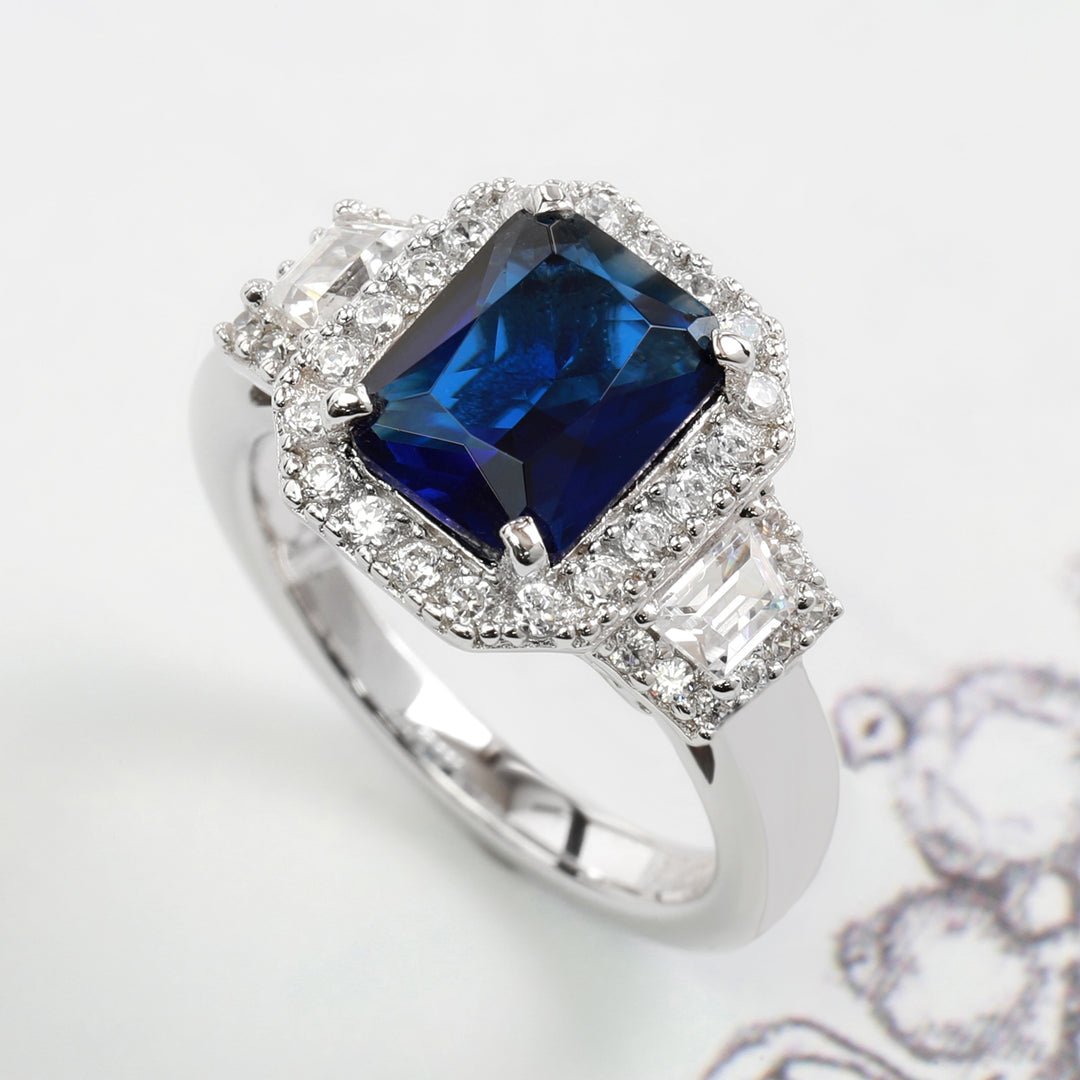 2.5 Carat Radiant Blue Sapphire Halo Cubic Zirconia Engagement Ring In Sterling Silver - Boutique CZ