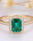 1.25 Carat Emerald Cut Lab Created Emerald and Moissanite Halo Engagement Ring in 14 Karat Gold - Boutique Pavè