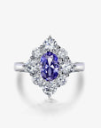 1.5 Carat Oval Cut 5A Rated Sapphire Blue Cubic Zirconia Fancy Halo Engagement Ring in Platinum Plated Sterling Silver - Boutique Pavè