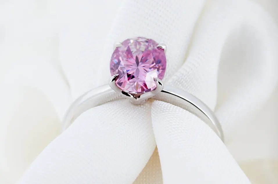 1.5 Carat Oval Cut Fancy Pink Moissanite Solitaire Engagement Ring in 18 Karat White Gold - Boutique Pavè