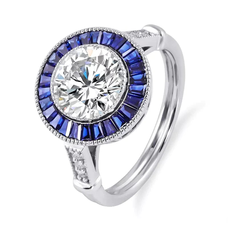 1.70 Carat Round Cut Moissanite and Lab Created Sapphire Engagement Ring in 14 Karat White Gold - Boutique Pavè