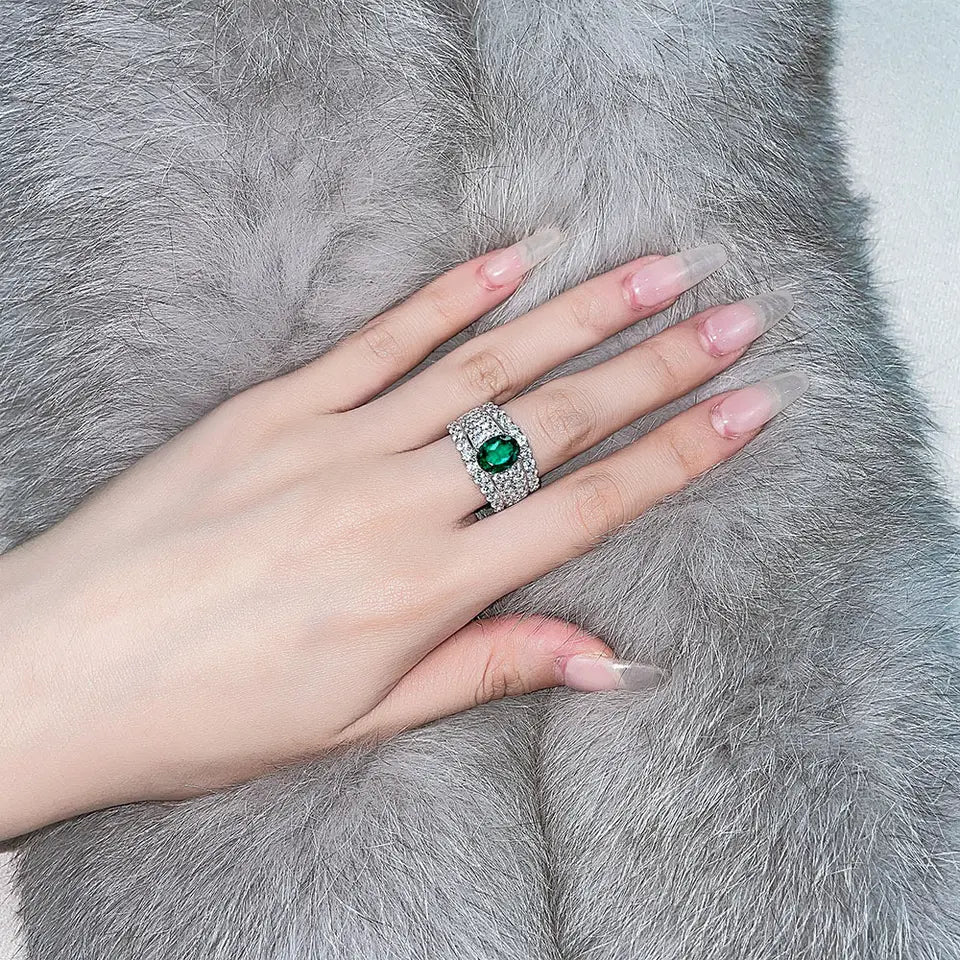 2 Carat Oval Cut Emerald Green Cubic Zirconia Designer Statement Ring in Platinum Plated Sterling Silver - Boutique Pavè