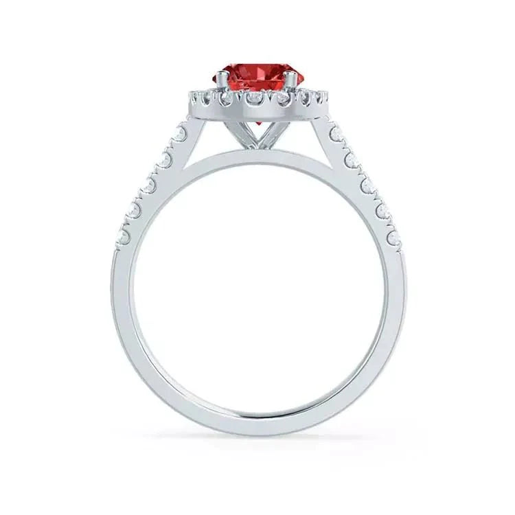 2 Carat Oval Cut Lab Created Ruby and Pave Moissanite Halo Engagement Ring in 18 Karat Gold - Boutique Pavè