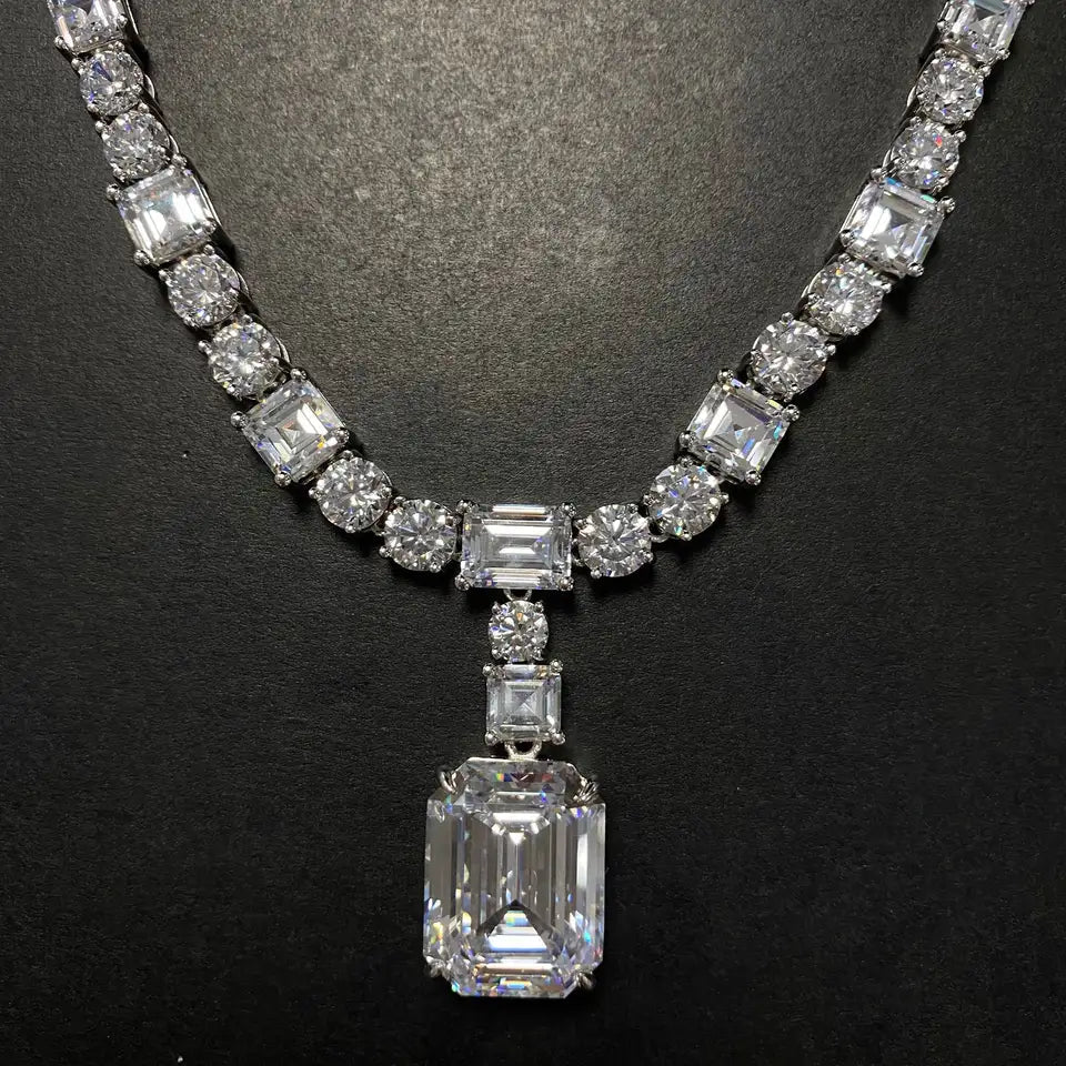 20 Carat Emerald Cut Imitation Diamond Cubic Zirconia Tennis Necklace in Platinum-Plated Sterling Silver - Boutique Pavè