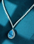 20 Carat Pear Cut Blue Cubic Zirconia Statement Necklace in Platinum-Plated Sterling Silver - Boutique Pavè