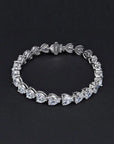 22 Carat Heart Cut Cubic Zirconia Statement Tennis Bracelet in Platinum-Plated Sterling Silver - Boutique Pavè