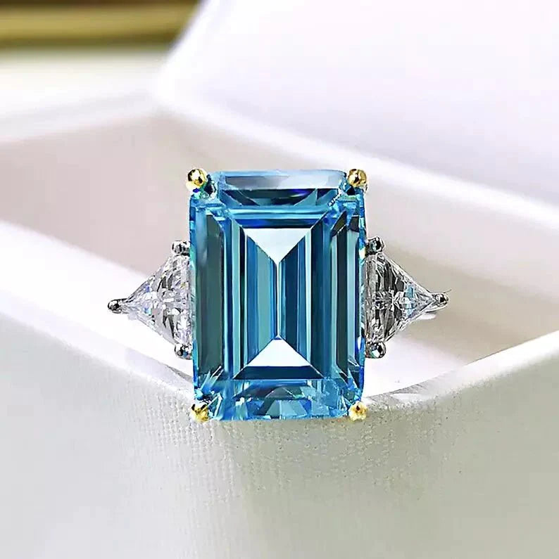 3 Carat Emerald Cut Fancy Blue Lab Created Diamond Solitaire Accent Engagement Ring in 18 Karat Gold - Boutique Pavè