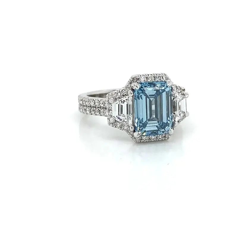 3 Carat Emerald Cut Lab Created Blue Diamond Pavè Halo Engagement Ring in 14 Karat White Gold - Boutique Pavè
