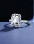 3 Carat Emerald Cut Moissanite Halo Engagement Ring in 18 Karat White Gold - Boutique Pavè