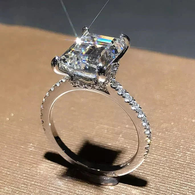 3 Carat Emerald Cut Moissanite Pave Solitaire Engagement Ring in 18 Karat White Gold - Boutique Pavè