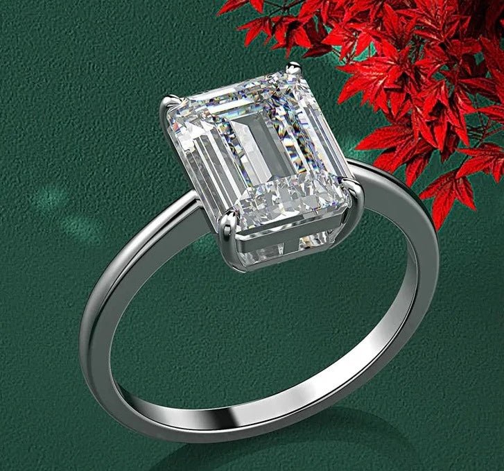 4 Carat Emerald Cut 5A Rated Cubic Zirconia Solitaire Engagement Ring in Platinum Plated Sterling Silver - Boutique Pavè