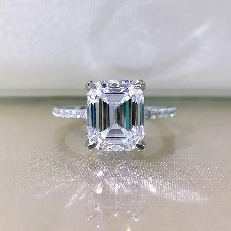 4 Carat Emerald Cut Cubic Zirconia Pave Solitaire Engagement Ring in Platinum Plated Sterling Silver - Boutique Pavè
