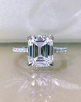 4 Carat Emerald Cut Cubic Zirconia Pave Solitaire Engagement Ring in Platinum Plated Sterling Silver - Boutique Pavè