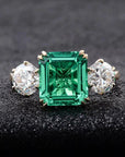 4 Carat Emerald Cut Lab Created Emerald and Round Moissanite Accent Engagement Ring in 14 Karat Yellow Gold - Boutique Pavè