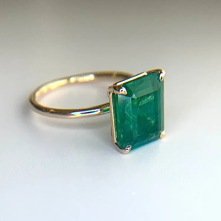 4 Carat Emerald Cut Lab Created Emerald Solitaire Engagement Ring in 14 Karat Yellow Gold - Boutique Pavè