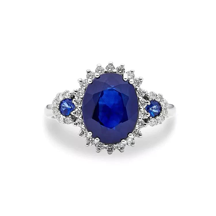 4 Carat Oval Cut Lab Created Sapphire and Moissanite Three Stone Engagement Ring in 14 Karat White Gold - Boutique Pavè