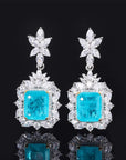6 Carat Emerald Cut Imitation Blue Topaz and Cubic Zirconia Celebrity Inspired Necklace and Earring Set in Platinum Plated Sterling Silver - Boutique Pavè