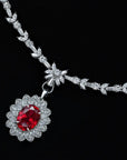 7.5 Carat Oval Cut Imitation Ruby and Cubic Zirconia Royalty Inspired Necklace in Platinum-Plated Sterling Silver - Boutique Pavè