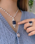 8 Carat Asscher Cut Sapphire Blue Cubic Zirconia Statement Necklace in Platinum-Plated Sterling Silver - Boutique Pavè