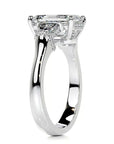Brilliant Four Carat Emerald Cut Hidden Halo Moissanite Engagement Ring in Platinum - Boutique Pavè