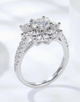 Brilliant Round Cut Moissanite Sunflower Halo Engagement Ring in Platinum Plated Sterling Silver - Boutique Pavè