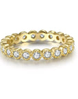 Copy of Petite Round Cut Lab Created Diamond Eternity Band in 18 Karat Yellow Gold - Boutique Pavè