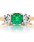 Cushion Cut Lab Created Emerald and Round Moissanite Three Stone Engagement Ring in 14 Karat Gold - Boutique Pavè