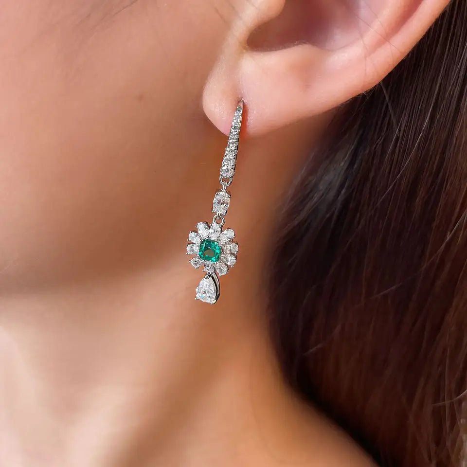 Elegant Asscher Cut Imitation Emerald and Cubic Zirconia Statement Drop Earrings in Platinum-Plated Sterling Silver - Boutique Pavè