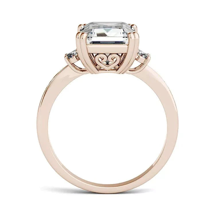 Four Carat Brilliant Emerald Cut Moissanite Accent Solitaire Engagement Ring in 14 Karat Rose Gold - Boutique Pavè