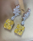 Four Carat Radiant Cut Fancy Canary Cubic Zirconia Statement Earrings in Platinum-Plated Sterling Silver - Boutique Pavè