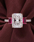 Four Carat Radiant Cut Moissanite and Lab Created Ruby Engagement Ring in 10 Karat Rose Gold - Boutique Pavè