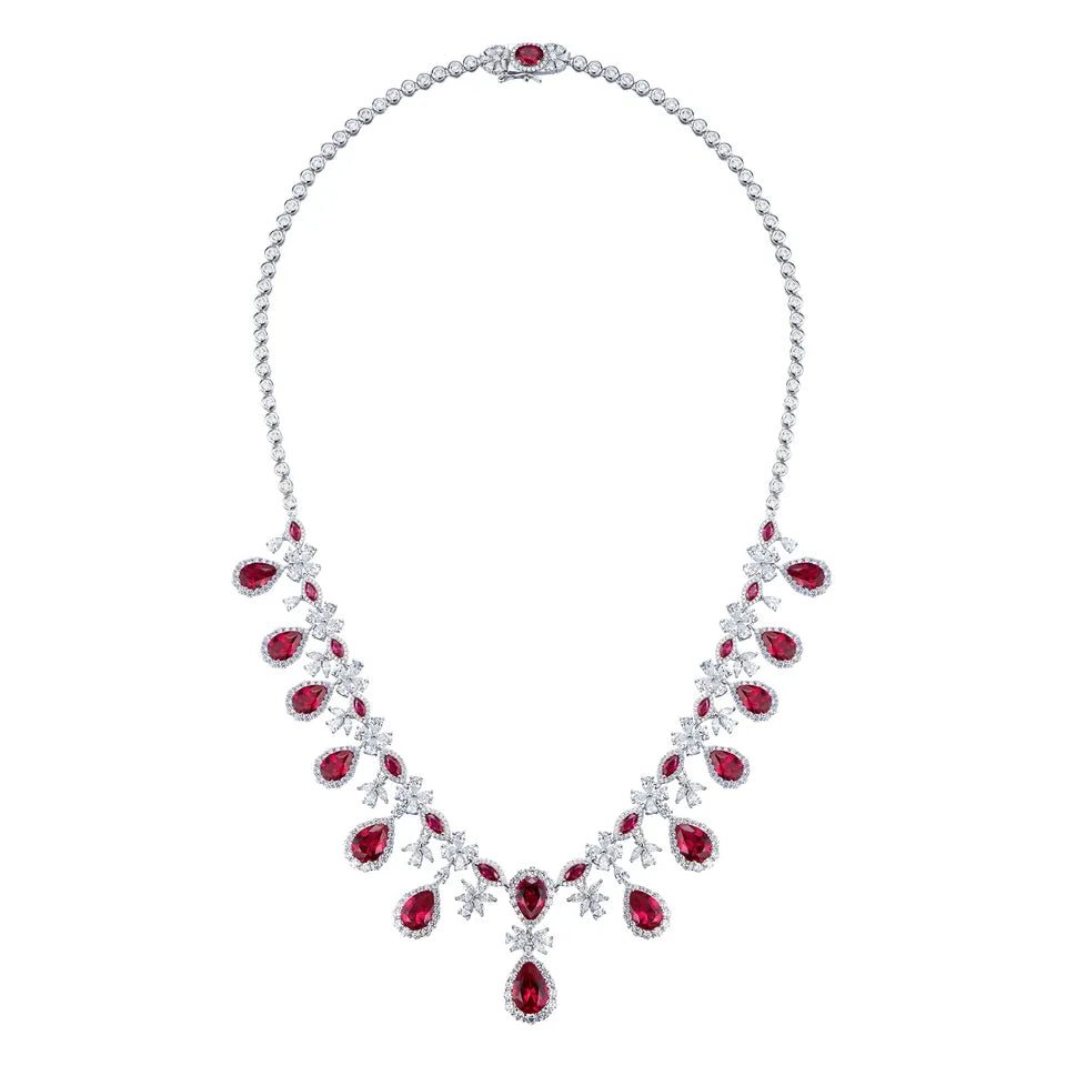 Glamourous Pear and Round Cut Imitation Ruby and Cubic Zirconia Statement Necklace in Platinum-Plated Sterling Silver - Boutique Pavè