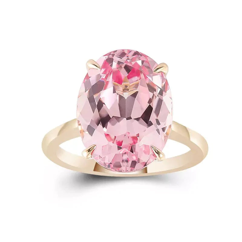 Nine Carat Oval Cut Lab Created Pink Sapphire Solitaire Ring in 14 Karat Yellow Gold - Boutique Pavè