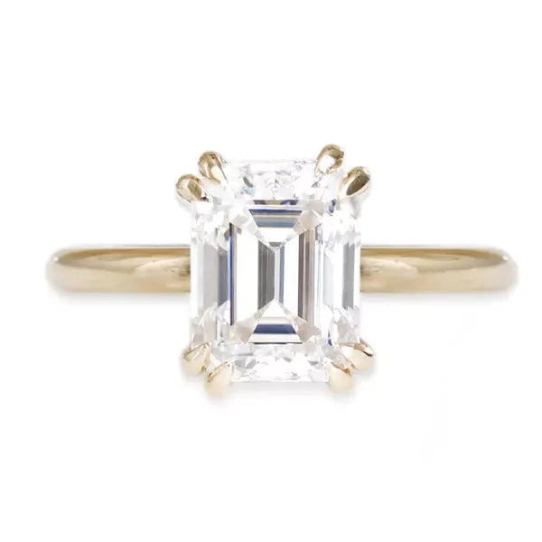One Carat Brilliant Emerald Cut Moissanite Solitaire Engagement Ring in 9 Karat White Gold - Boutique Pavè
