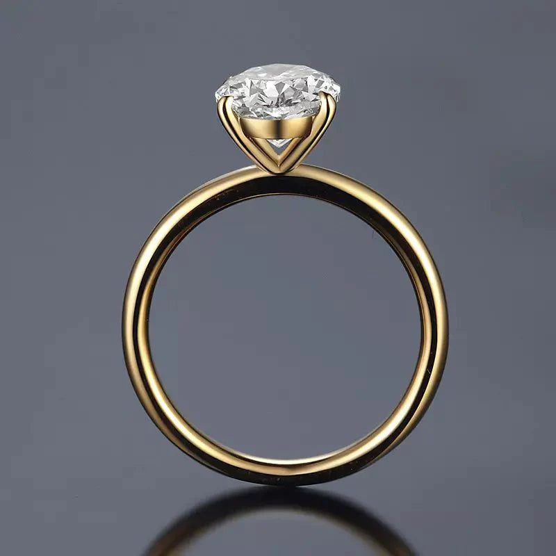 One Carat Brilliant Oval Cut Solitaire Engagement Ring in 18 Karat Yellow Gold - Boutique Pavè