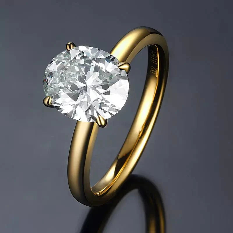 One Carat Brilliant Oval Cut Solitaire Engagement Ring in 18 Karat Yellow Gold - Boutique Pavè