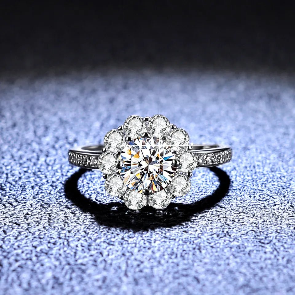 One Carat Brilliant Round Cut Moissanite Daisy Flower Halo Engagement Ring in Platinum Plated Sterling Silver - Boutique Pavè