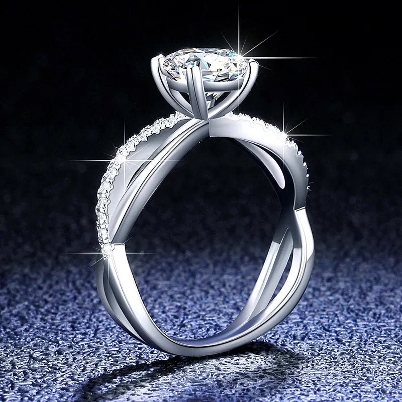 One Carat Brilliant Round Cut Moissanite Split Twisted Shank Engagement Ring in Platinum Plated Sterling Silver - Boutique Pavè