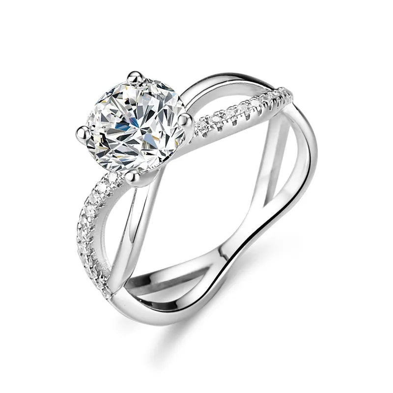One Carat Brilliant Round Cut Moissanite Split Twisted Shank Engagement Ring in Platinum Plated Sterling Silver - Boutique Pavè