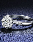 One Carat Moissanite Flower Shaped Halo Engagement Ring in Platinum Plated Sterling Silver - Boutique Pavè