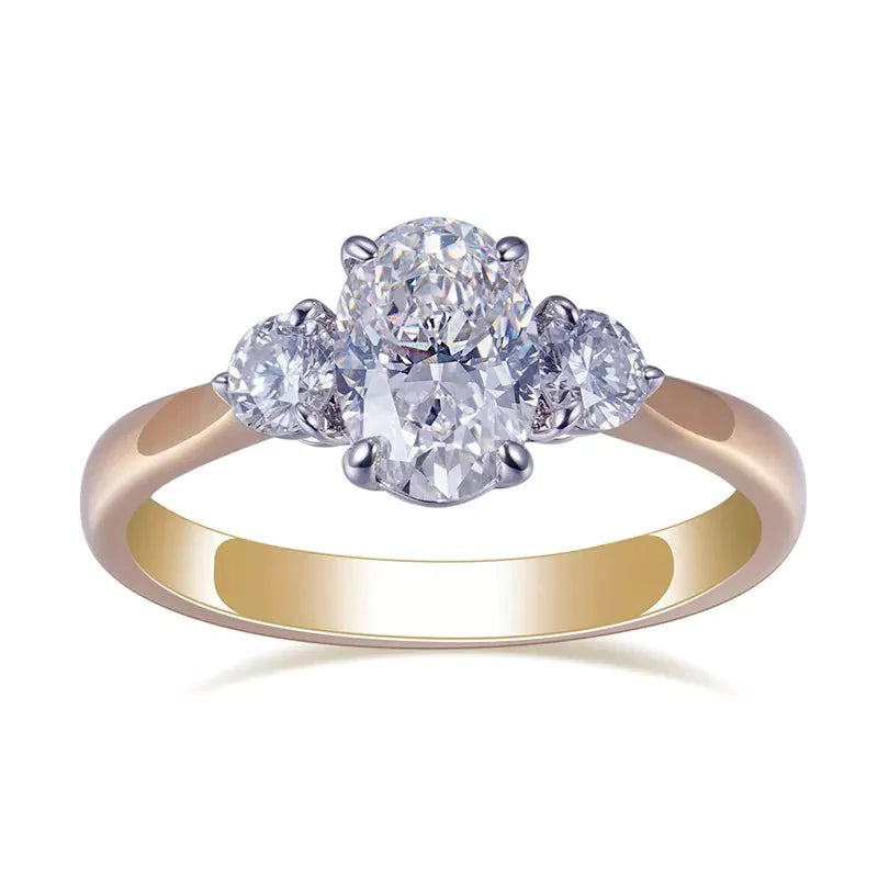 One Carat Oval and Round Cut Lab Created Diamond Three Stone Engagement Ring in 18 Karat Two Tone Gold - Boutique Pavè