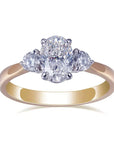 One Carat Oval and Round Cut Lab Created Diamond Three Stone Engagement Ring in 18 Karat Two Tone Gold - Boutique Pavè