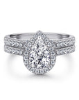 One Carat Pear Cut Luxury Cubic Zirconia Halo Engagement and Wedding Ring Set in Platinum - Boutique Pavè