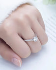 One Carat Round Cut Lab Created Diamond Bridge Accent Engagement Ring in 18 Karat White Gold - Boutique Pavè