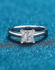 One or Two Carat Brilliant Princess Cut Moissanite Solitaire Engagement Ring in Platinum Plated Sterling Silver - Boutique Pavè