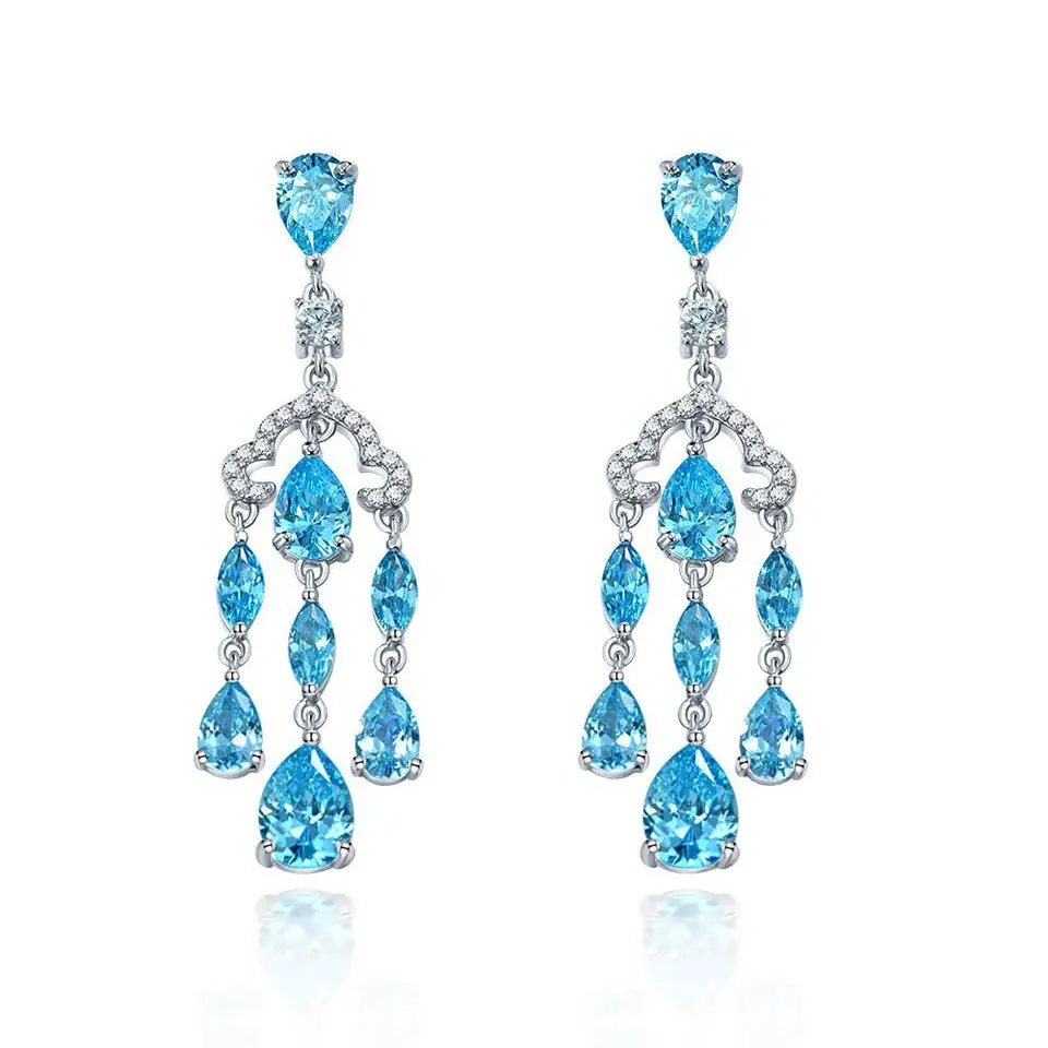Pear and Round Cut Blue Topaz Cubic Zirconia Fancy Dangle Earrings in Platinum-Plated Sterling Silver - Boutique Pavè