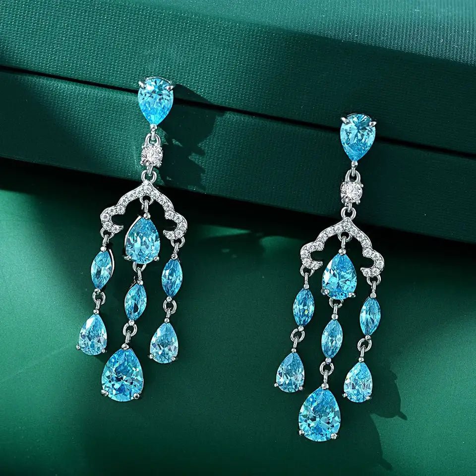 Pear and Round Cut Blue Topaz Cubic Zirconia Fancy Dangle Earrings in Platinum-Plated Sterling Silver - Boutique Pavè